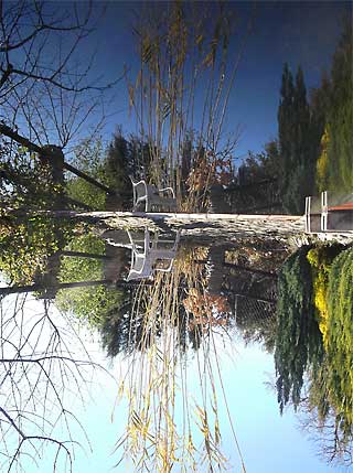 Reflection from the Alberca - water store and swimming pool